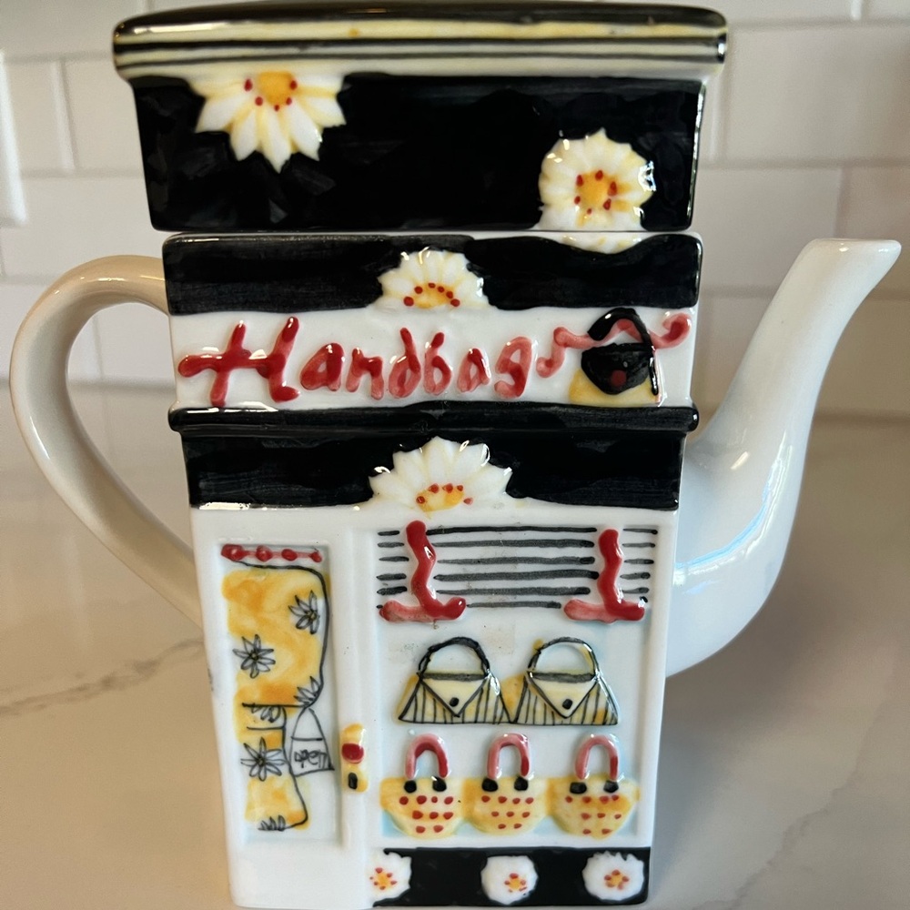 Reversible ceramic teapot, Handbags one side, BANK, other side, 7 inches tall